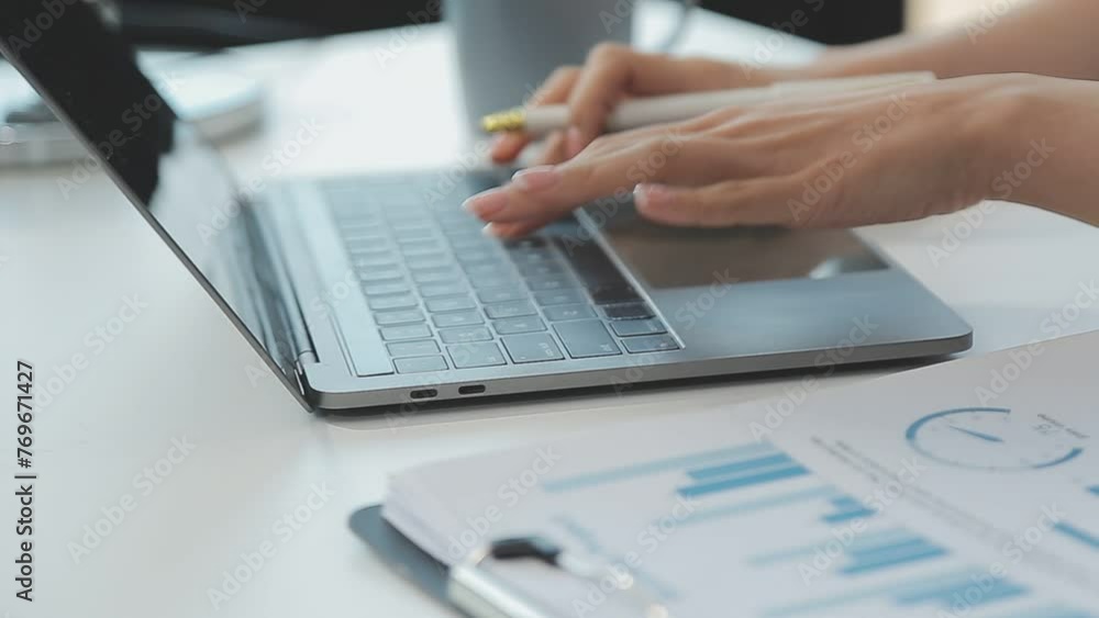 Business woman using calculator for do math finance on wooden desk in office and business working background, tax, accounting, statistics and analytic research concept Business woman using calculator for do math finance on wooden desk in office and business working background, tax, accounting, statistics and analytic research concept