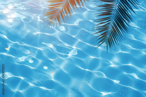 A palm leaf gracefully drifts in a tranquil pool, creating mesmerizing ripples on the surface of the water