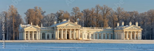 A colossal white building stands stoically atop a vast field blanketed in shimmering snow