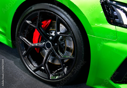Car alloy wheel and disc-brake sport car © I Viewfinder