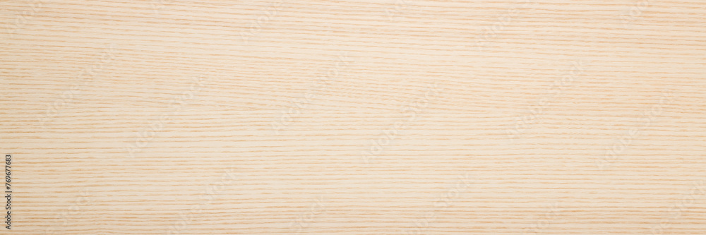 Light ash veneer wooden surface background. Closeup. Empty place for text. Wide banner. Top down view. Light ash veneer wooden surface background. Closeup. Empty place for text. Wide banner. Top down view.
