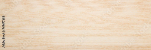 Light ash veneer wooden surface background. Closeup. Empty place for text. Wide banner. Top down view.