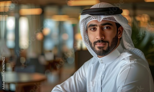 A businessman Emirati young man portrait in his office