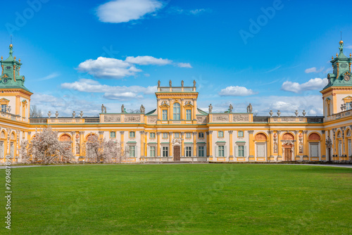 Warszawa, Poland - April 18: Focus on View of the central facade of the Royal Wilanow Palace. Spring in the park photo