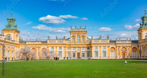 Warszawa, Poland - April 18: Focus on View of the central facade of the Royal Wilanow Palace. Spring in the park