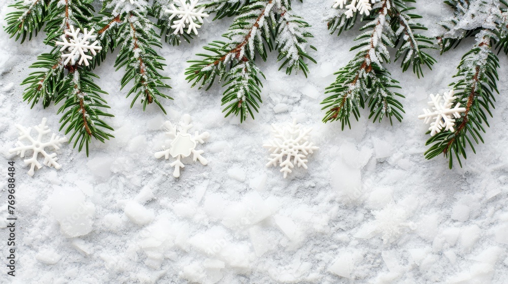 Christmas frame with spruce branch, snowflakes on snowy background, space for text placement