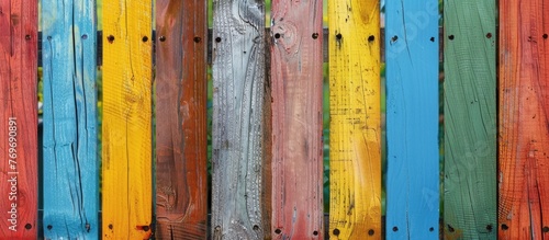 Colorful wooden fence with white photo paper