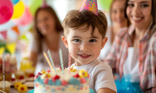 Young Boy's Birthday Party with Family and Festive Cake