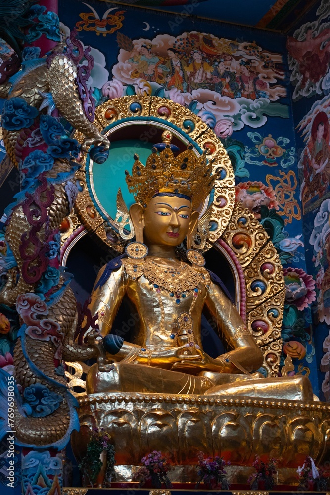 Sculpture of Maitreya Buddha in the Buddha Temple of the Namdroling Monastery in Karnataka, India