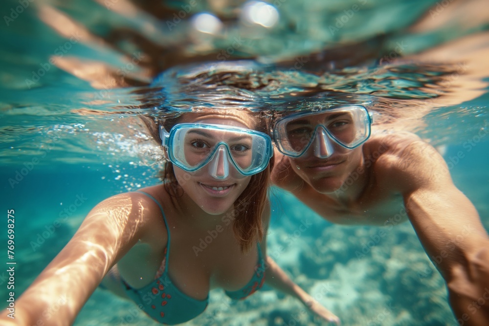 Naklejka premium Underwater Selfie of Smiling Couple
