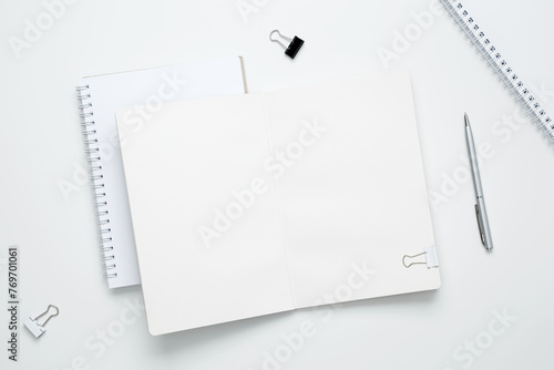 Wallpaper Mural Creative flat lay mockup design of workspace. Top view composition with white notebook Torontodigital.ca