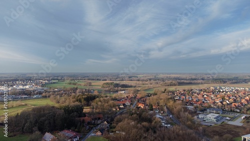 Aerial view of a suburbian area under a cloudy sky in Walsrode, Germany photo