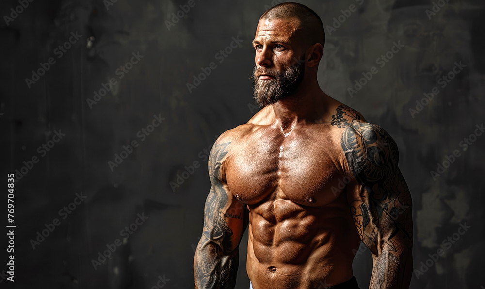 A muscular athletic man, studio background