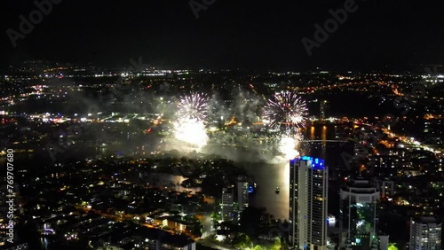 Wallpaper Mural Aerial of bright fireworks shining in the nighttime sky over the illuminated city Torontodigital.ca