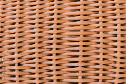 Wicker basket. pattern of wicker light basket close-up, wood concept