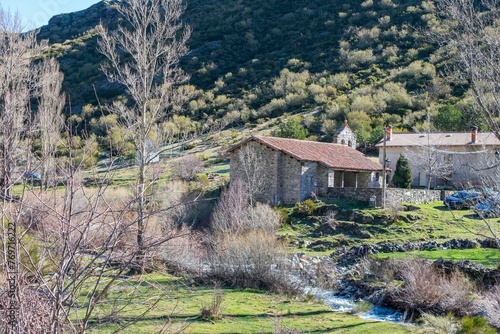 Houses on a hill covered in greenery in Pozo de las Lomas, Palencia, Spain