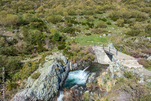 Small stream flowing in mountains in Pozo de las Lomas, Spain