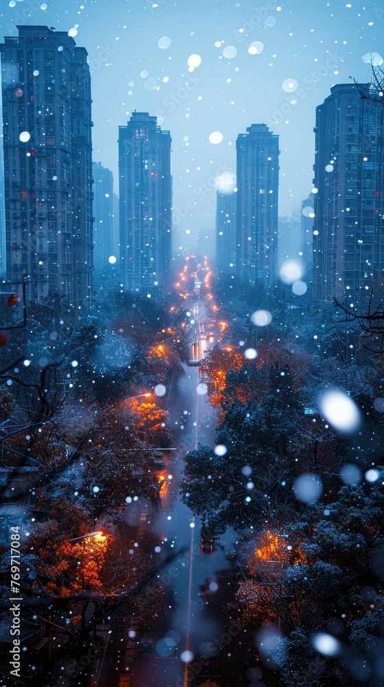 view of a snowfall falling in winters on the street road with buildings
