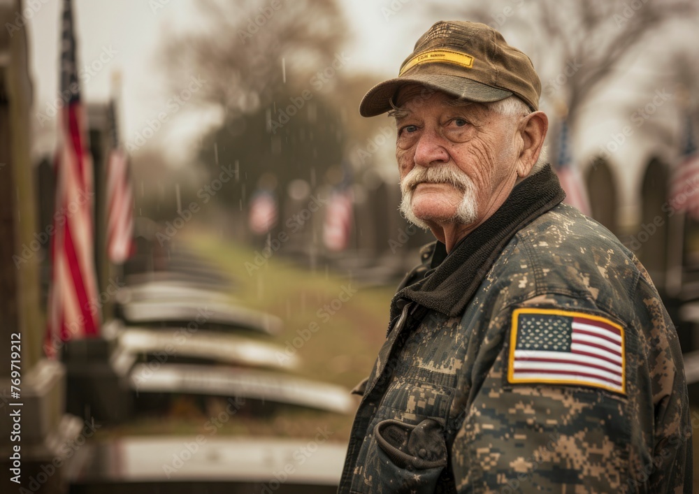 A Sad Elderly Soldier Visiting a Military Cemetery, Standing In The Rain, Cloudy Day, Gravestones With American Flags On The Side