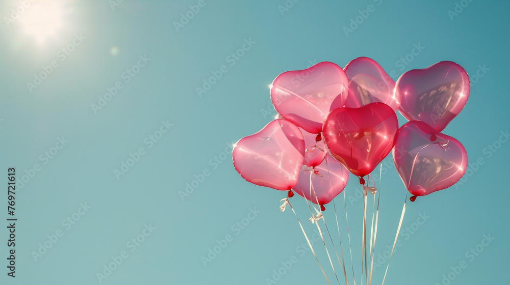 High-resolution image of a bouquet of pink heart-shaped balloons against a clear blue sky their glossy surfaces reflecting the bright sun - obrazy, fototapety, plakaty 