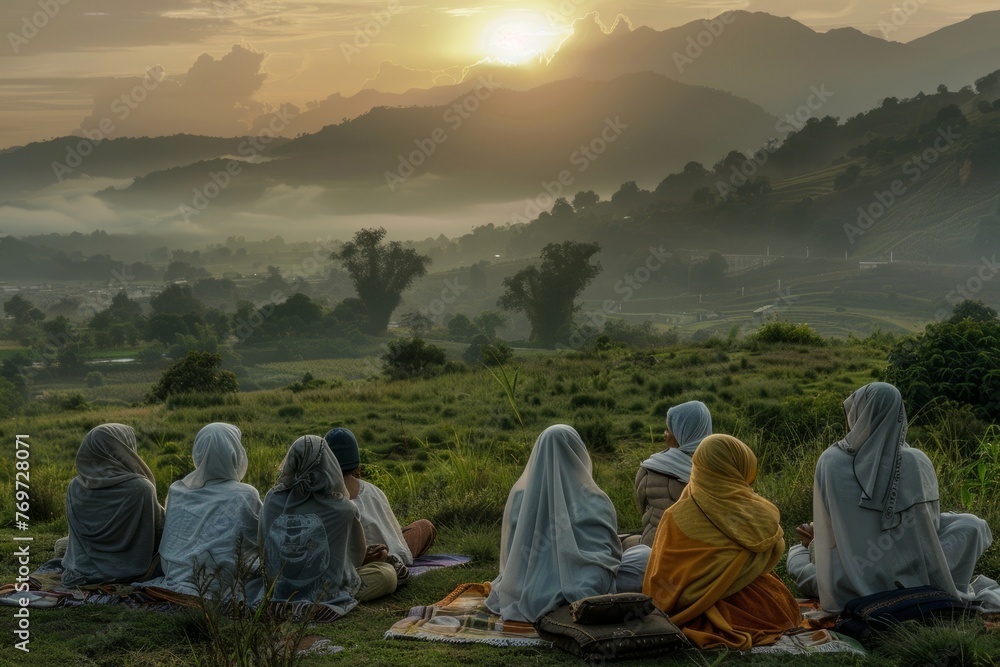 Pilgrims taking a break and reflecting on a lush green field during their journey