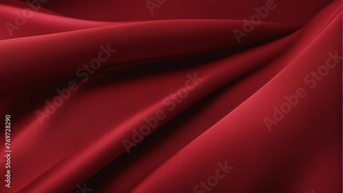 a red fabric with some very long folds on it's end