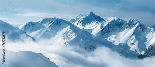 panorama view of cold snowy mountains ranges peaks at altitude landscape covered with clouds at daytime