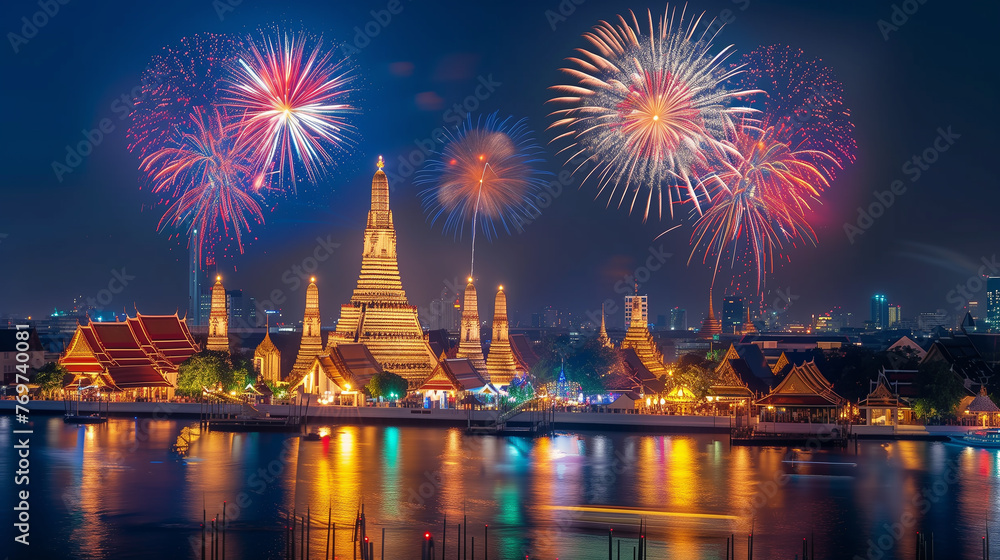 Naklejka premium Thailand temple in the night time, firework on background, newyear festival with the temple