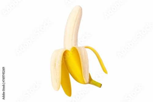 Close-up of a peeled ripe yellow banana isolated on white background