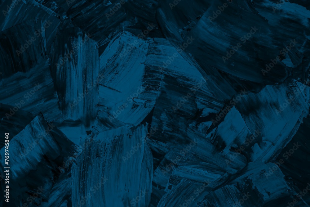 Array of black and blue spatula strokes abstract paining arranged in a decorative display