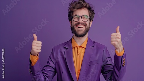 professional sideways portrait photo of expressive nerdy man of 30 in a purple suit orange shirt shows thumbs up in action on a purple background isolated   photo