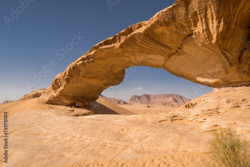 Huge and not well-known Jebel Kharraz arch in the Wadi Rum desert, Jordan