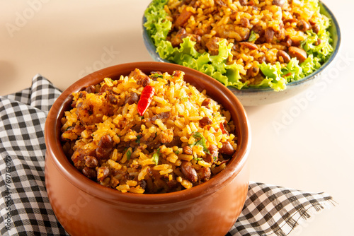 Φωτογραφία Baião de Dois traditional Brazilian food made with rice, beans, sausage and renn