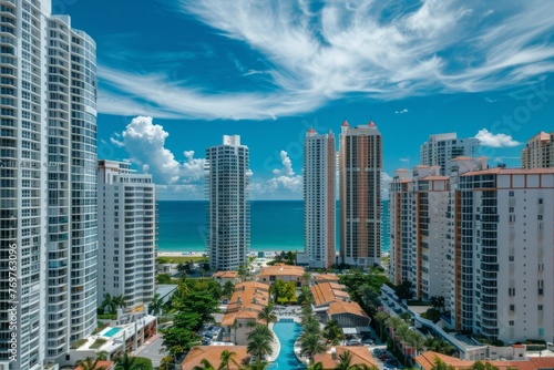 A wide shot of the buildings in Sunbums Beach, Miami, with an ocean view, white and grey skyscrapers in the style of aerial photography Generative AI