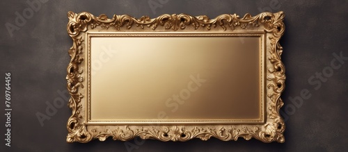 An antique gold picture frame, made of metal and in a rectangular shape, hangs on a beige wall. It adds a touch of elegance to the room © pngking