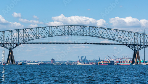 Francis Scott Key Bridge - Baltimore, Maryland USA - Patapsco River - Cargo Ships and Baltimore Cityscape in Background photo