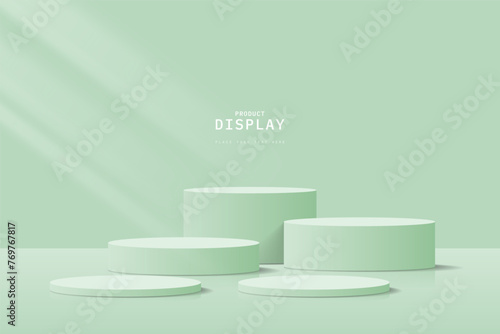 Abstract soft 3D room with set of realistic green cylinder pedestal podium. Minimal scene for product display presentation. 3d vector geometric platform design. Stage for showcase  cosmetic.