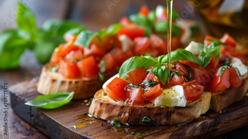 A fresh bruschetta with tomato, basil, and mozzarella, with olive oil drizzling