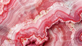Macro texture reveals the striking patterns and colors in a pink agate stone slice, perfect for backgrounds