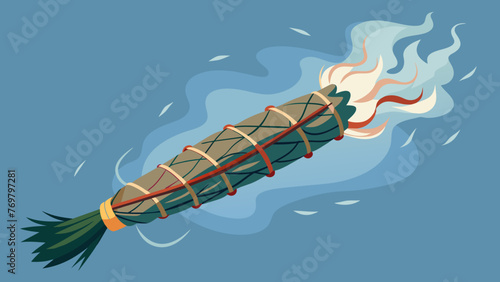  A smudge stick made of dried sage and tied with vibrant thread sends swirls of smoke into the air as it is used in a cleansing ceremony.