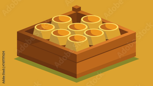  A close up of a wooden box filled with variously sized bamboo cups representing the more natural and sustainable approach to cupping therapy in