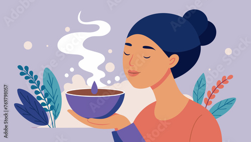  A closeup of a persons face as they inhale steam from a bowl of hot water infused with eucalyptus and lavender.