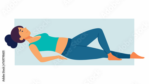  A woman lies on her back with her legs up the wall her hands resting on her stomach. She practices deep belly breathing inhaling healing energy