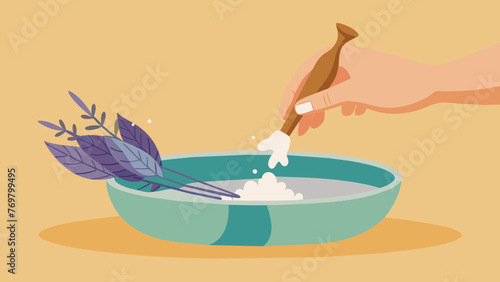  A glimpse of a bundle of dried sage being carefully dipped into the bath releasing its cleansing and purifying essence. The hand steadies the