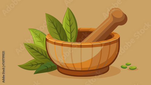  A closeup of an old wooden mortar and pestle worn smooth from years of grinding various plants and herbs for medicinal purposes.