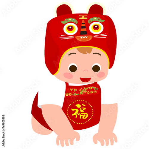 A baby wearing chinese first birthday ceremy traditional costumes. photo