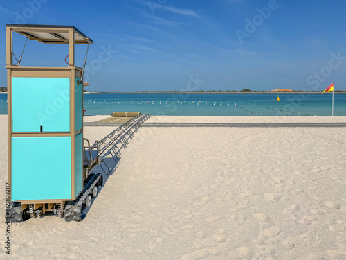 device that provides independent access to the sea for people with reduced mobility. Abu Dhabi beach, United Arab Emirates