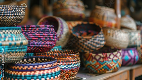 Colorful woven baskets displayed on shelves, showcasing intricate patterns and craftsmanship. © Татьяна Макарова
