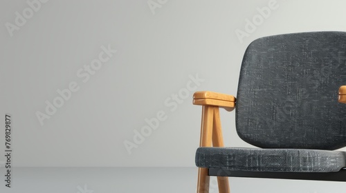 Padded stacking auditorium style chair on a plain white seamless background 