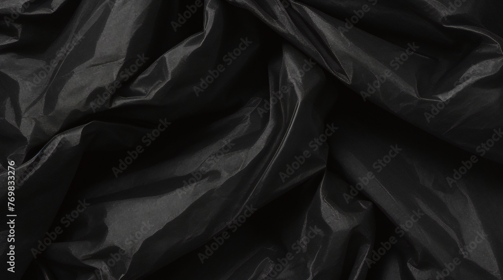 full frame abstract background of crumpled black plastic film bag full frame abstract background of crumpled black plastic film bag